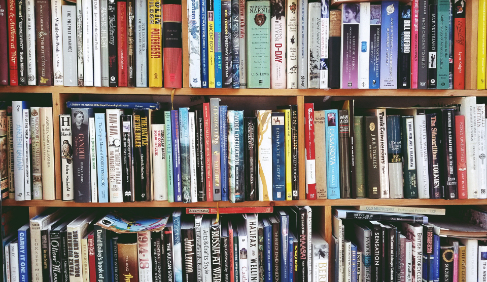 Books and a person